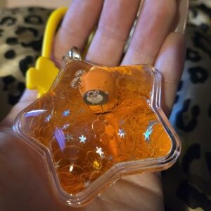 Orange Star-Shaped Kids Toy with Animal Figure